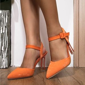 Orange buckled heels, size 6. Brand new never worn